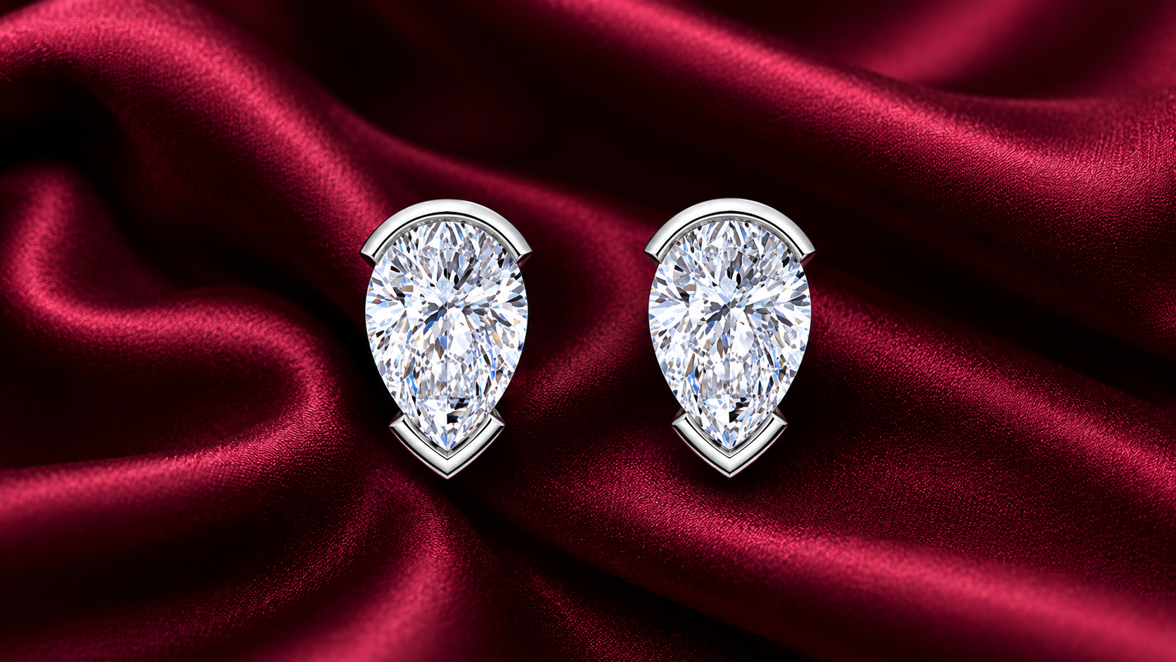 Seraphina Pear Moissanite Stud Earrings